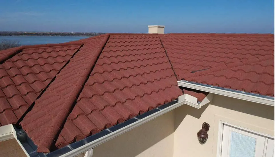 Red Spanish tile roof on a home overlooking a lake